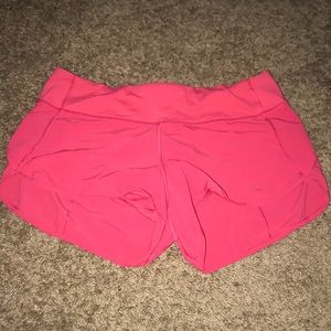 Neon pink lululemon shorts